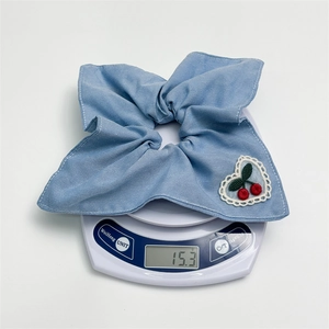 Denim blue floral headscarf scrunchie with embroidered cherry and lace trim weighing 15.3g