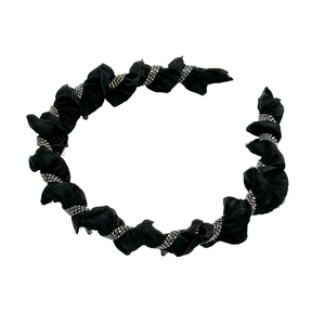 Elegant black velvet twisted headband with sparkling silver rhinestone trim for women