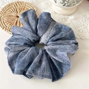Elegant large blue oversized scrunchie with silver grid texture and layered pleated design