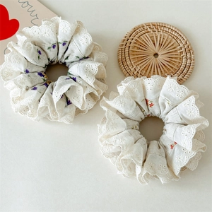 Floral print scrunchies with white lace edges set of two for hair styling