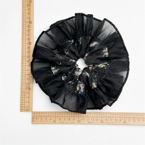 Oversized black organza scrunchie with floral pattern and ruffled edges 20cm
