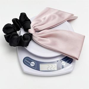 Pink satin bow scrunchie for women, lightweight hair tie accessory weighing 22.2g