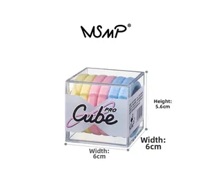 Détail de 6 élastiques à cheveux colorés dans une boîte de rangement cube transparente