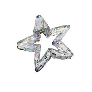 Holographic star-shaped acrylic hair claw clip for ponytail styling on white background