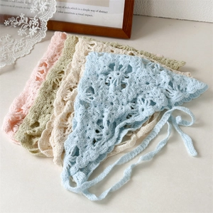 Detailed close-up of hollow knit floral bandanas in pink, green, cream, and blue colors