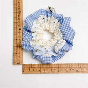 Blue plaid scrunchie with lace trim, ribbon bow, and pearl detail, 12cm diameter