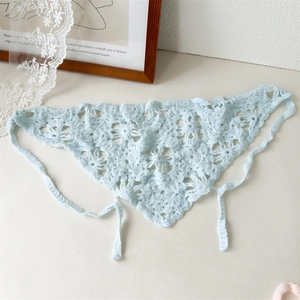 Detailed crochet hollow flower pattern on light blue knit bandana for vintage styling
