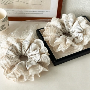 Lace layered cream white scrunchies with black polka dot patterns in a set of two pieces