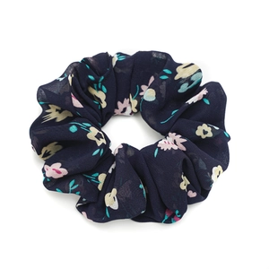 Floral chiffon scrunchie in navy blue with pink flower patterns for ponytail hair