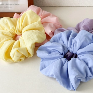 Pastel oversized fabric scrunchies set in yellow pink blue and purple colors