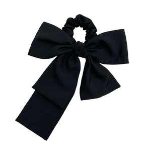 Elegant large black bow scrunchie with long ribbons for French style women hairstyles