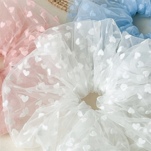 Sweet tulle heart pattern scrunchies in pastel pink, white and blue colors
