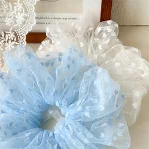 Sweet large mesh scrunchies with heart patterns in light blue and white colors