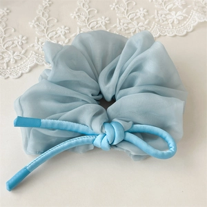 Elegant light blue organza scrunchie with silk luster and matching cord detail