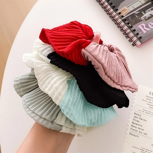 Detail view of multi-color pleated scrunchies set featuring elegant chiffon texture and high elasticity