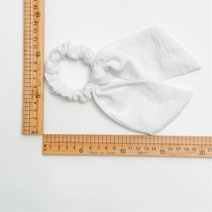 White striped fabric scrunchie with long ribbon bow measuring 14-15cm for women ponytail
