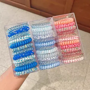 Three-pack set of high-elasticity spiral telephone wire hair ties in sea salt blue tones