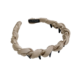 Elegant champagne satin twisted headband with black anti-slip teeth for women