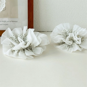 Double-layered white polka dot lace scrunchies for hair ties in elegant minimalist style
