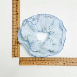 Floral print light blue oversized scrunchie measuring 15cm for summer hairstyles