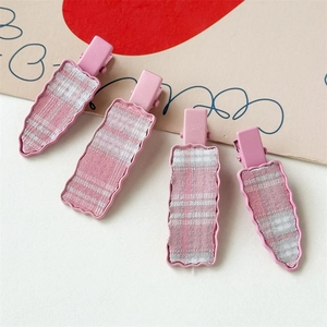 Set of 4 pink plaid hair clips with cute geometric shapes for girls and women