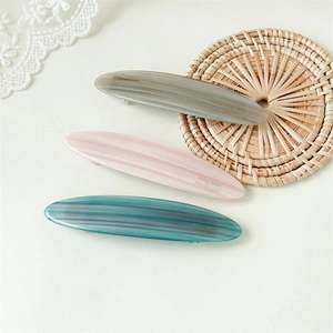 Three-piece set of minimalist marble-textured acetate hair clips with handmade engraving