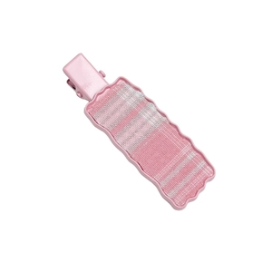 Sweet pink and white checkered fabric hair clip with wavy edges on white background