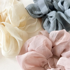 Puff chiffon oversized scrunchies in cream, blue, and pink with pleated texture