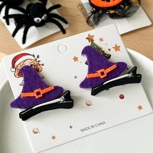 Detail of purple wizard hat hair clips with orange buckle for Halloween costumes