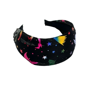 Wide Halloween headband with gold stars and bat patterns on black textured fabric