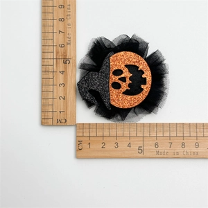 Référence de taille pour pince à cheveux citrouille d'Halloween avec paillettes et tulle