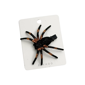 Halloween black spider hair clip with orange glitter legs on white display card