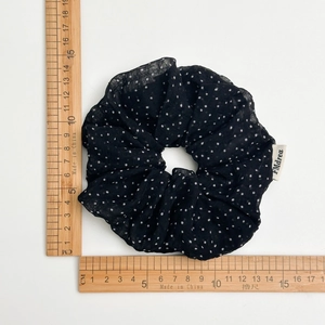 Large vintage black polka dot scrunchie made of chiffon fabric for ponytails