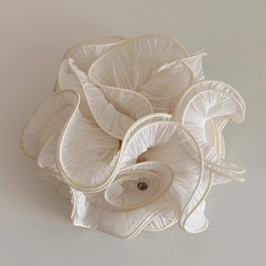Romantic cream mesh flower scrunchie with layered pleats and center crystal detail
