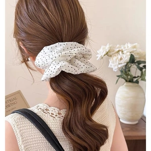 Vintage white oversized polka dot scrunchie with black dots and elastic chiffon texture