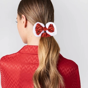 Festive red sequin bow scrunchie with white faux fur trim and velvet hair tie