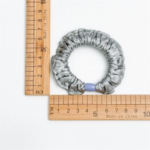 Silver-grey satin scrunchie with light blue bead, 6.5cm diameter for ponytails