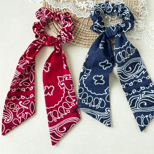Floral paisley pattern hair scrunchies with long ribbons in red and navy blue