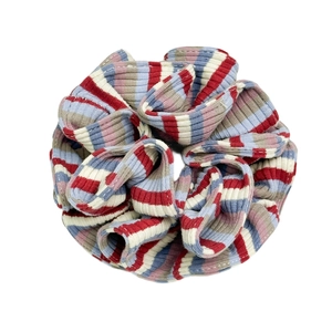 Colorful red blue and white striped scrunchie with soft knitted texture for women