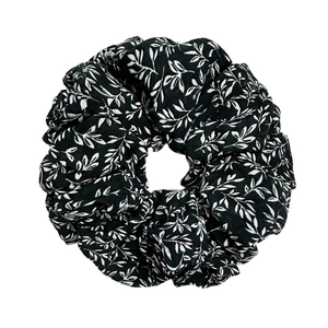 Elastic oversized scrunchie with elegant black and white ink leaf pattern for women