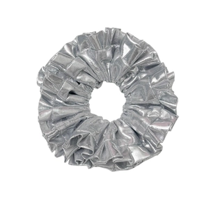 Metallic silver pleated scrunchie hair tie with high-shine finish on white background