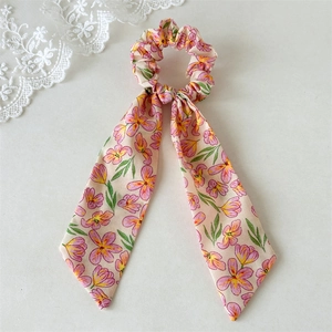 Elegant floral chiffon hair scrunchie with long ribbon tails and purple flower print
