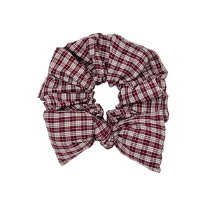Vintage red and white plaid bow scrunchie accessory for elegant low ponytail hairstyles
