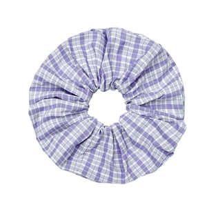 Elegant purple checkered fabric scrunchie with soft plaid pattern for stylish ponytails
