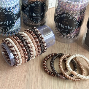 Neutral tones high-elasticity braided hair ties set in a transparent cylinder package