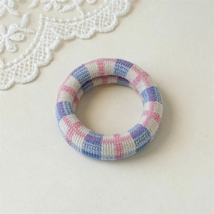 Detail of pink and blue checkered knitted hair tie with seamless high elasticity band