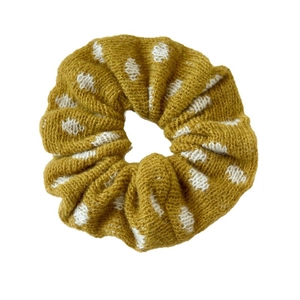Knitted oversized scrunchie in mustard yellow with white dot texture for winter