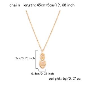 Detail of layered gold necklace with water drop zircon pendants and adjustable 45cm chain