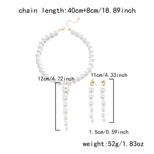 Retro faux pearl jewelry set with long tassel necklace and matching drop earrings