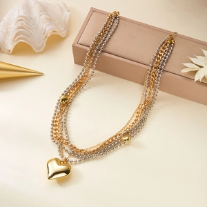 Collier multi-rangs élégant avec pendentif coeur doré et chaînes à billes argent